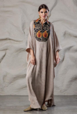 Beige kaftan with pomegranate collar